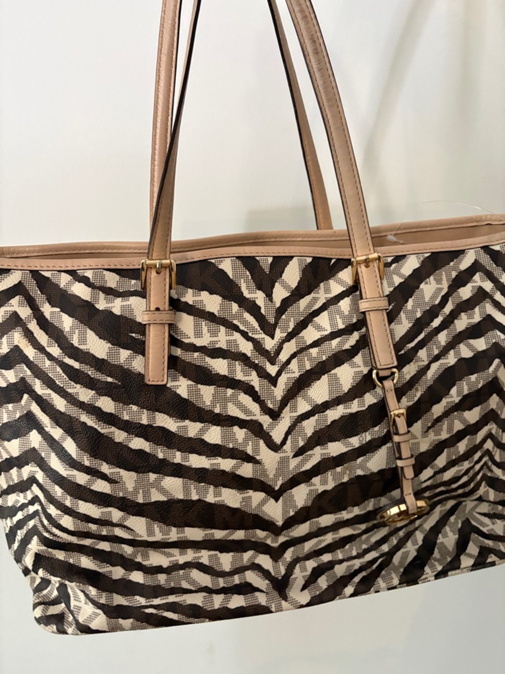 Live listing Michael Kors Brown Zebra Print Tote Bag